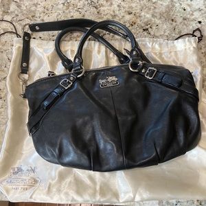 Black Coach bag with duster.